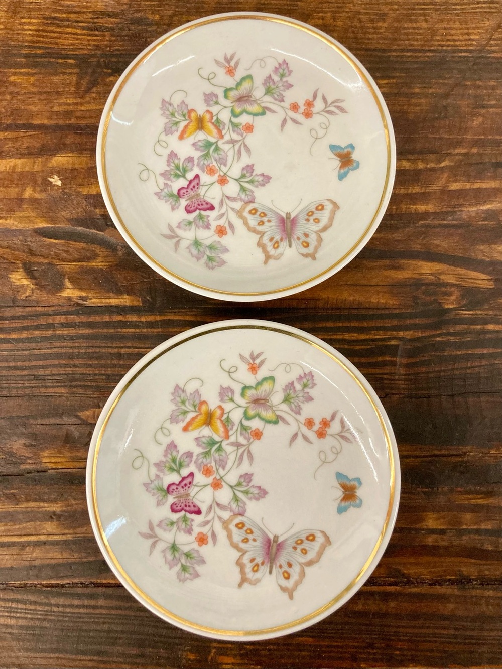 2 Vintage Avon Porcelain Mini Plates 22k Gold Trim 1979 Floral Butterflies 4.25"